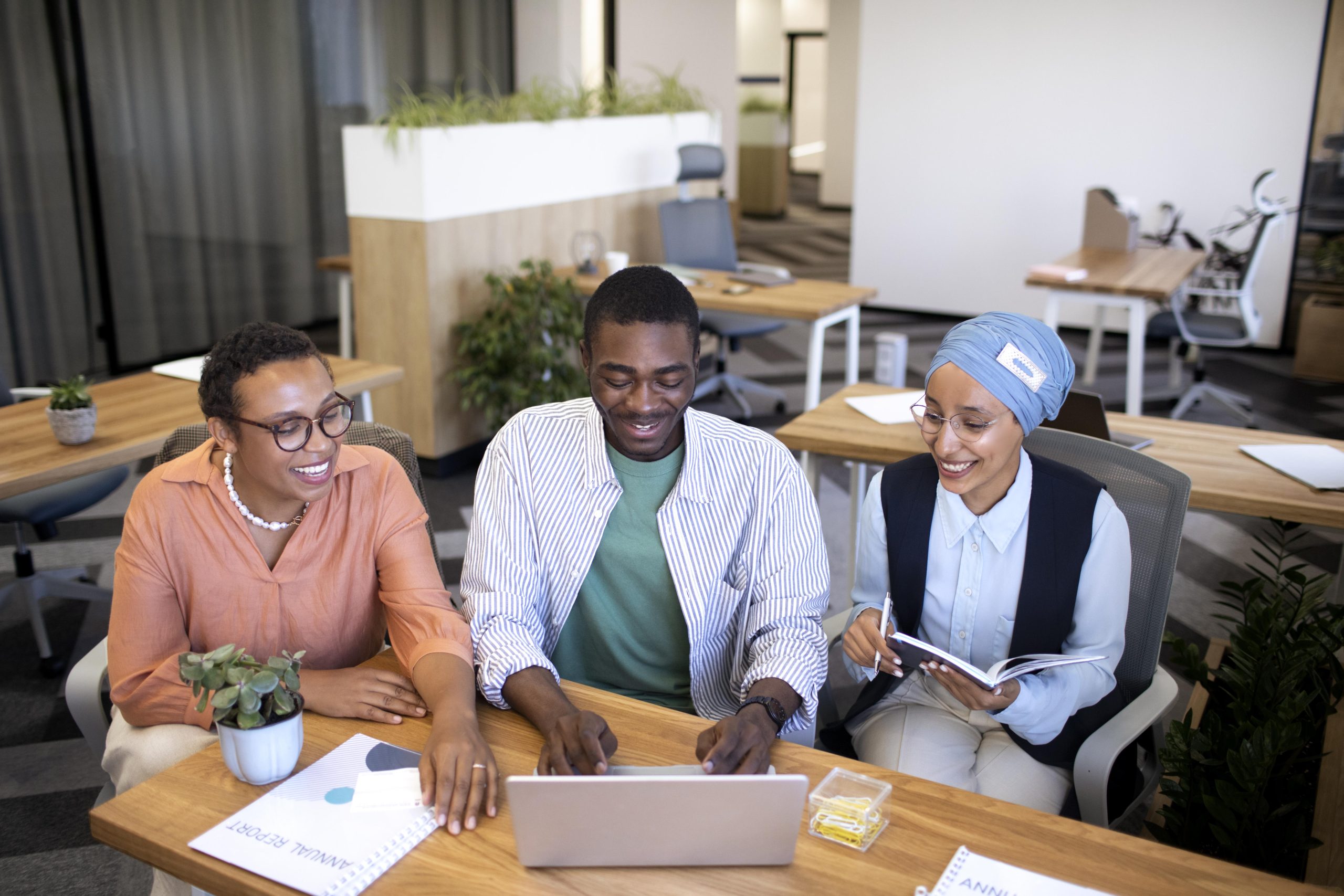 male-employee-getting-used-his-new-office-job-along-with-female-colleagues